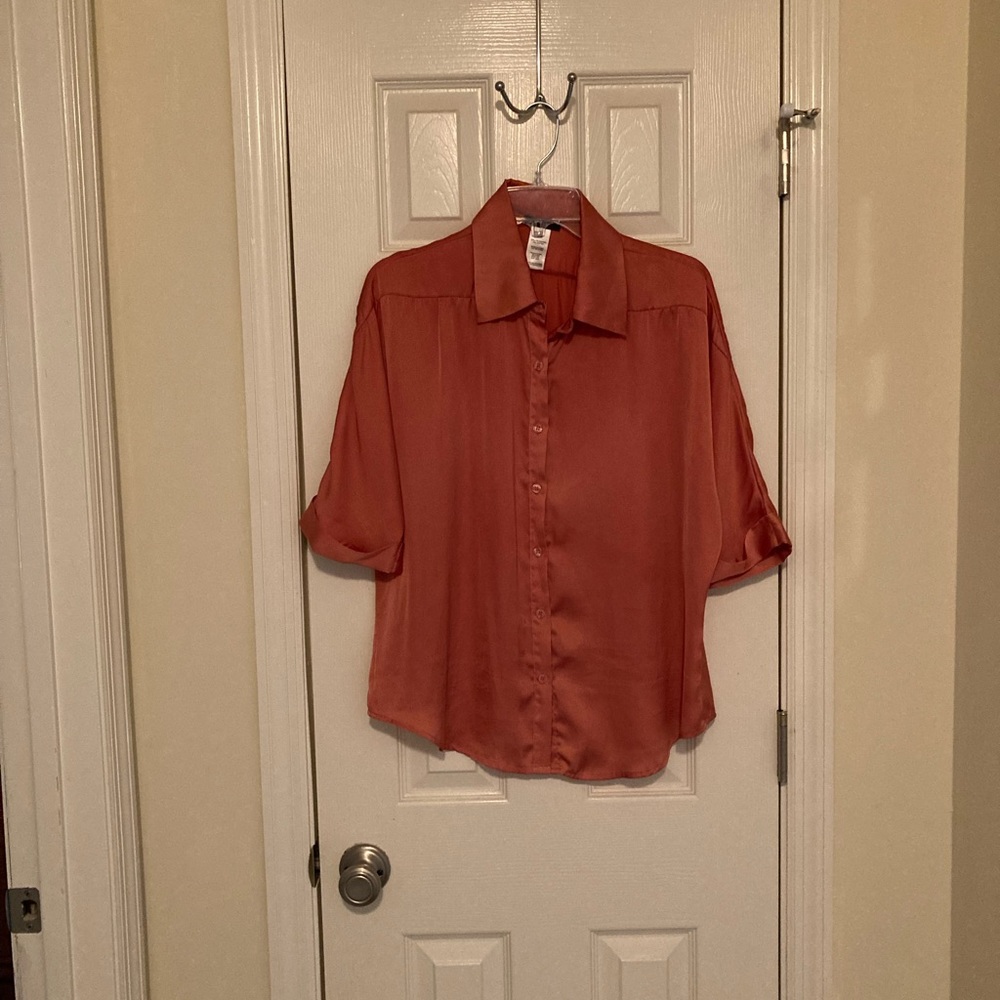 Size Large burnt orange silky top